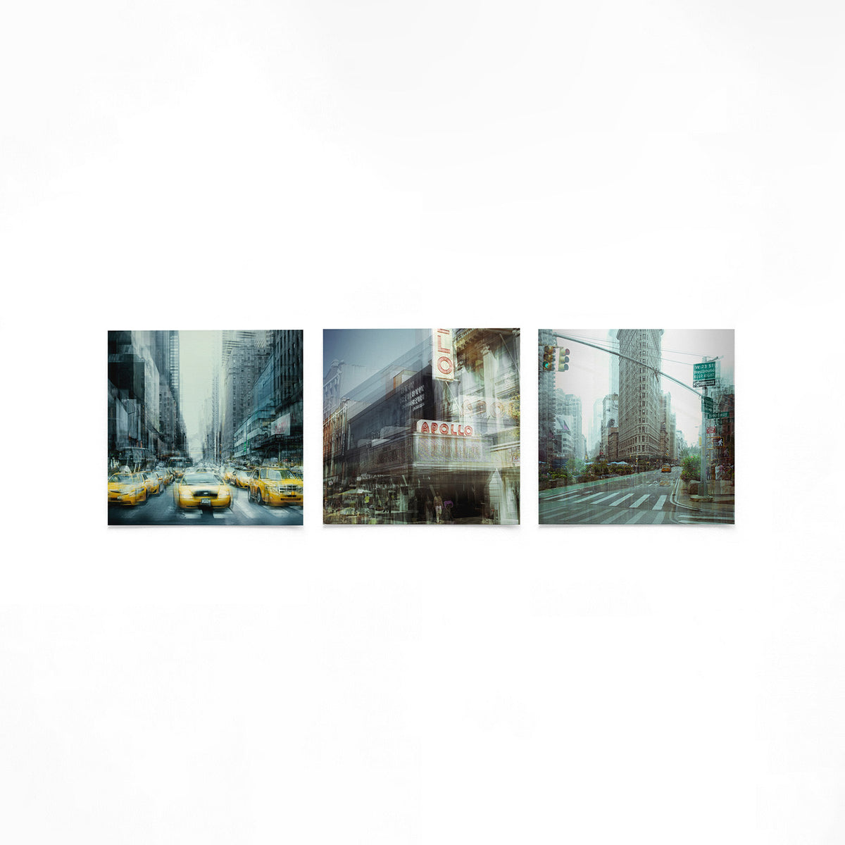 Productfoto van drie vierkante posters met stad in dubbele belichting – Gerald Emming