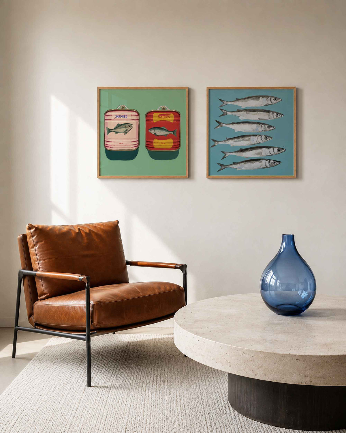 Interieurpresentatie van een tweedelige vierkante posterset met sardines en ansjovis