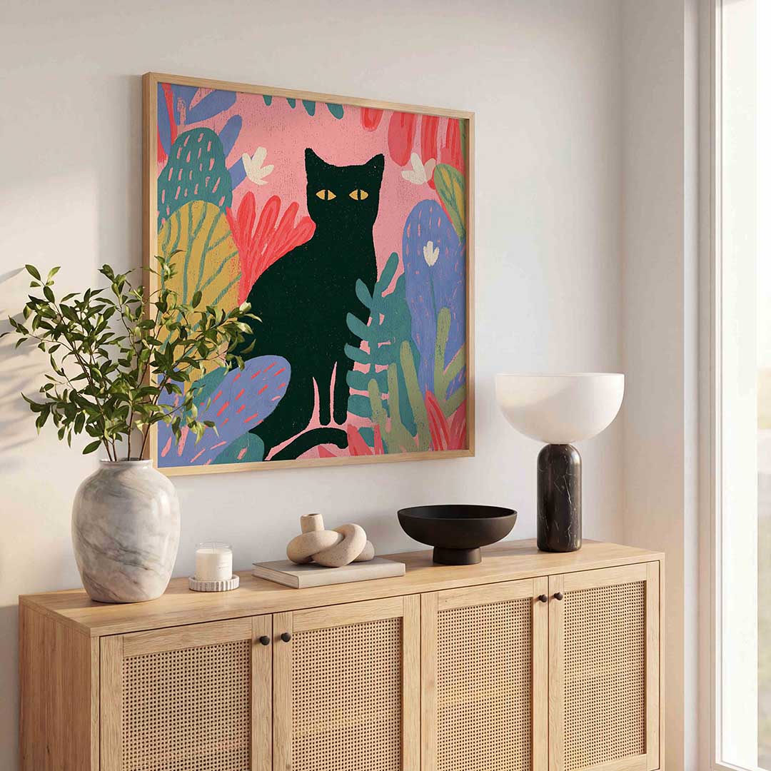Zwarte kat met kleurrijke bladeren Poster