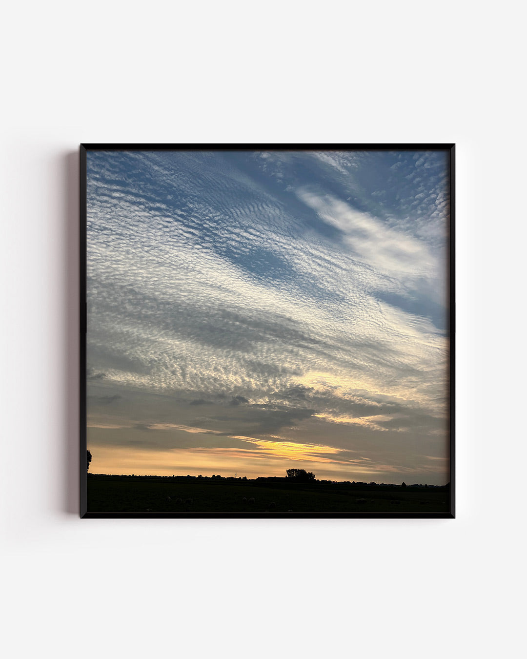 Luchtlandschap bij zonsondergang Poster