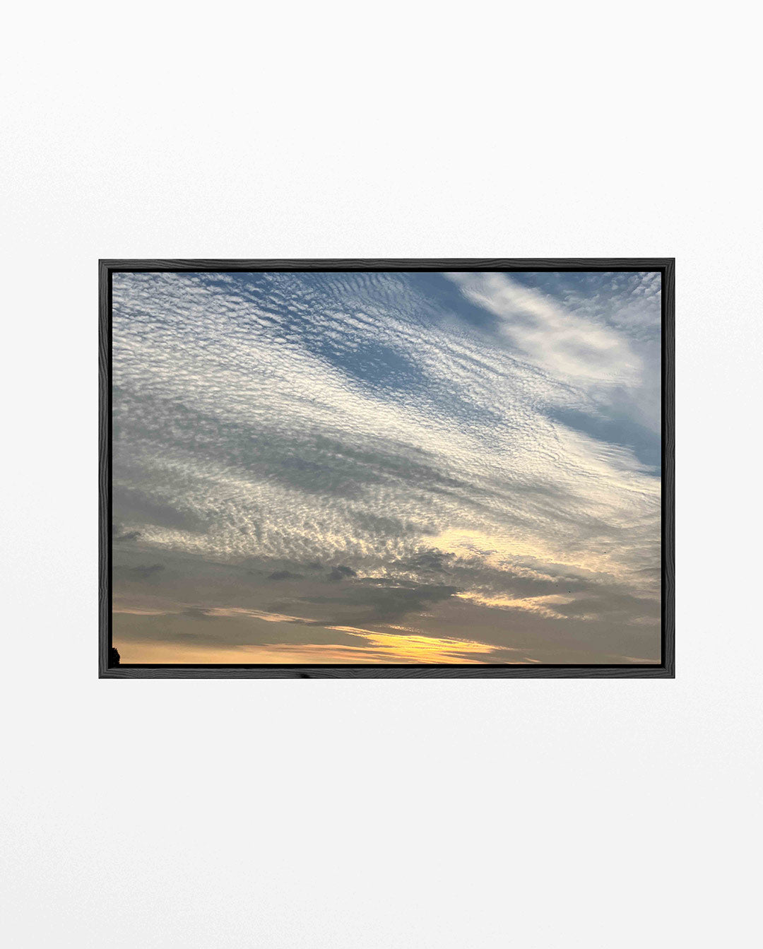 Wolkenspel bij zonsondergang Kunstwerk