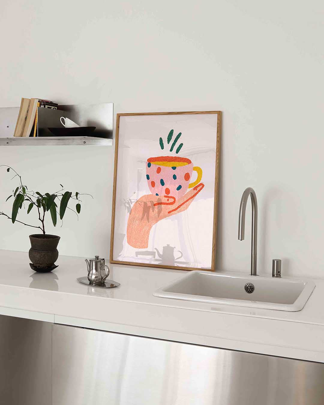 Hand met kopje Poster
